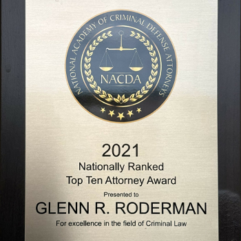 A plaque from the National Academy of Criminal Defense Attorneys presented to Glenn R. Roderman.